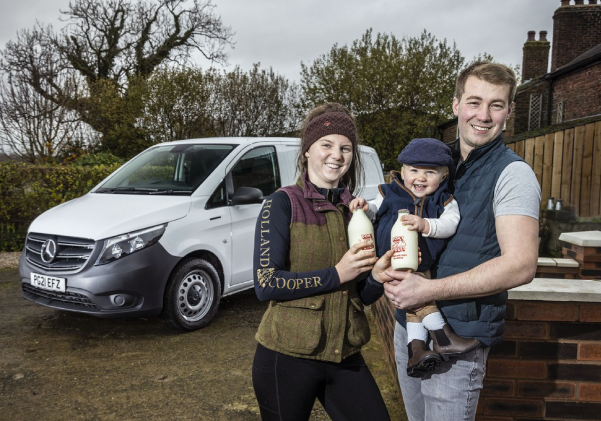 Generation-game:Milkman-John-Fiddler-with-partner-Annie-Miller-and-one-year-old-son-Elijah,-and-their-new-Mercedes-Benz-eVito-text-image